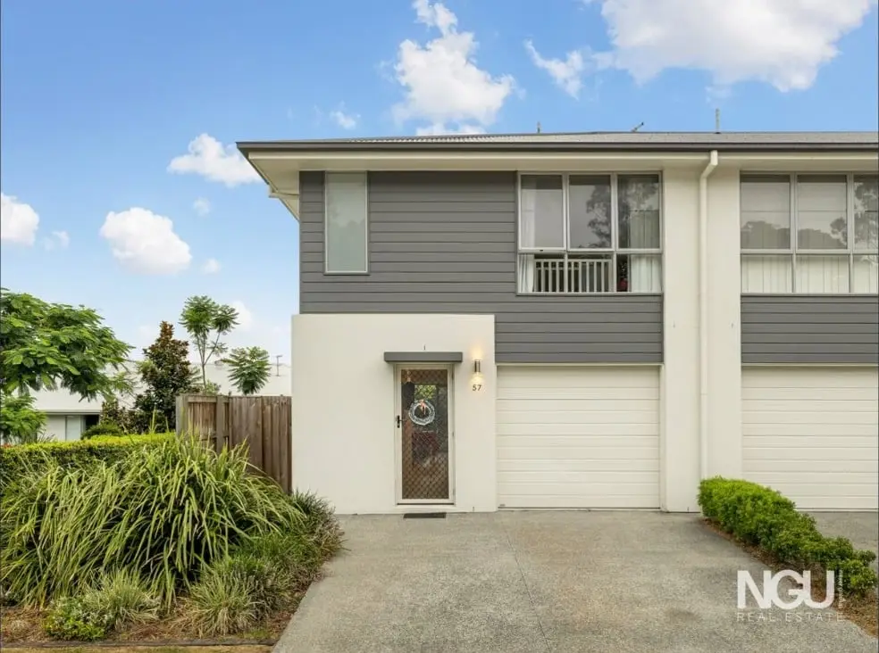 Two-storey grey and white townhouse with a single garage and front garden at 57/18 Bronzewing Street, Redbank Plains