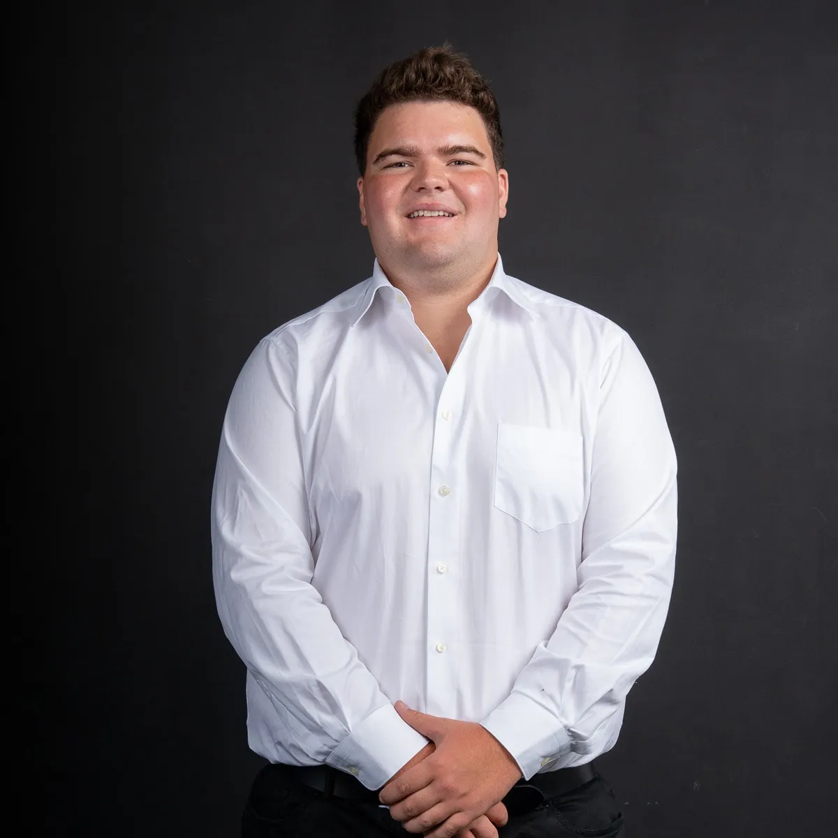 Lachlan Hodgson, Land Acquisitions at Amassed, in a white shirt