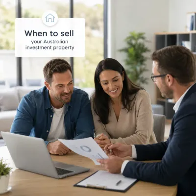 Property investor couple reviewing investment performance and sale timing strategy with a buyers agent in Australia